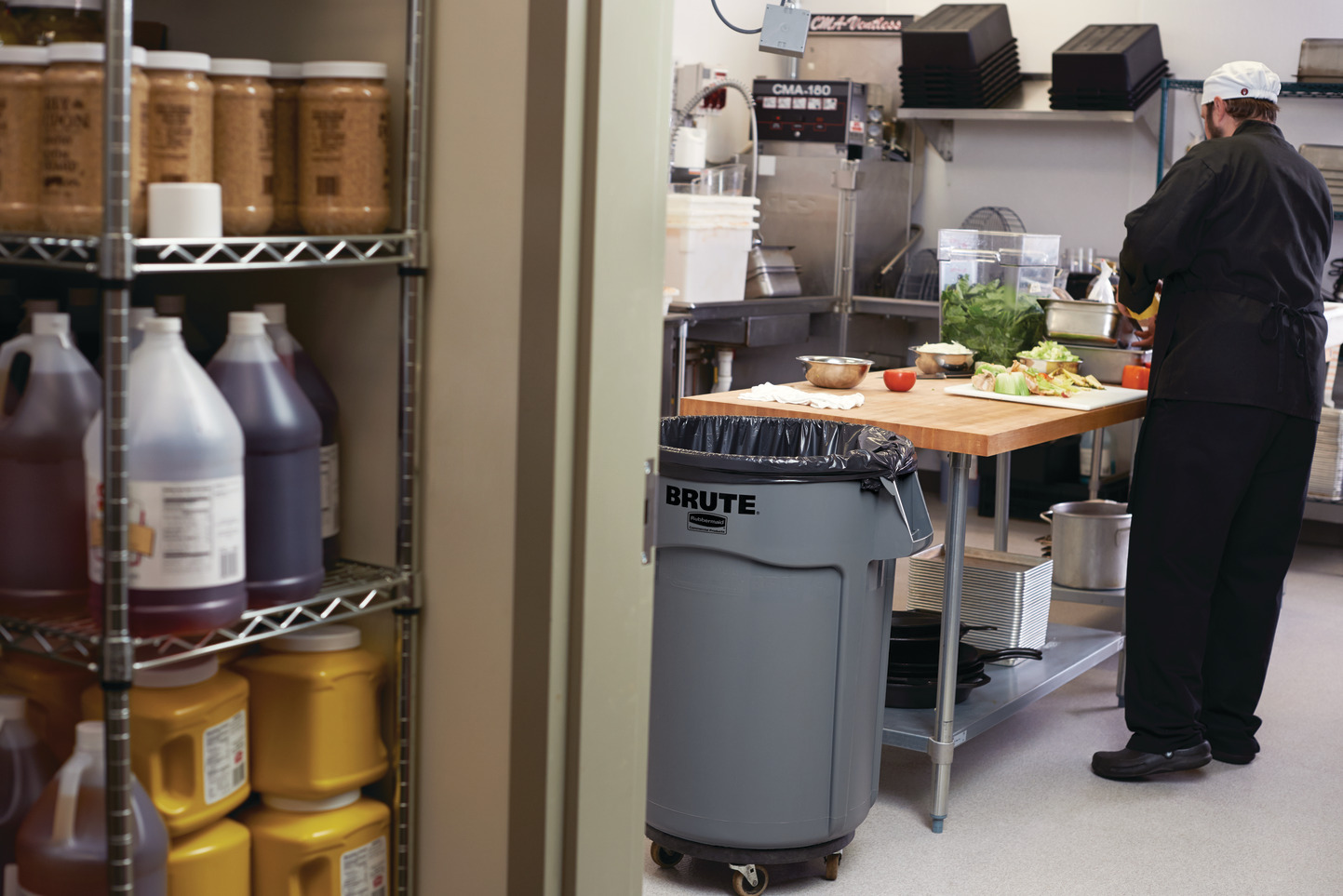 Chef preparing vegetables on a kitchen counter